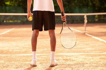 Man in sportswear at the tennis courts