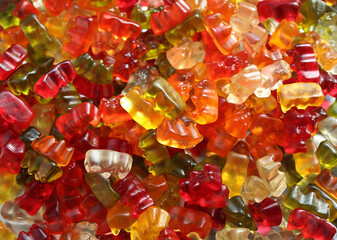 a bunch of colorful little bears - gelatin sweets, background