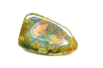 Close-up macro opaque tumbled ocean jasper, smooth colorful chalcedony crystal stone isolated on a...