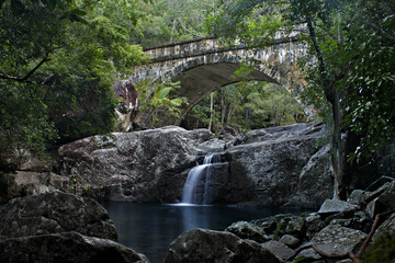 bridge with a small waterfall, crystal creek Australia