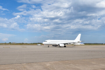 Wide angle view of planes on the tarmac at the airport - obrazy, fototapety, plakaty