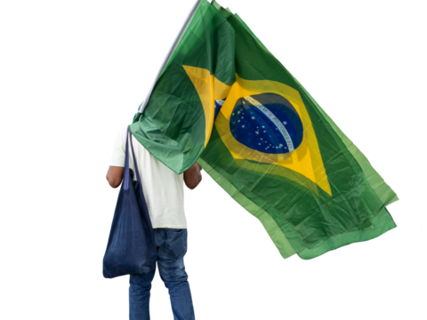 Person holding a Brazilian flag, in a cropped photograph, green yellow, blue and white, and written ORDER E PROGRESSO in Portuguese. Cut out.. - Powered by Adobe