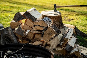 Split firewood with maul fire ring splitting wood