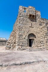 Naklejka premium A view towards the entrance of an old desert fort at Azraq, Jordan in summertime