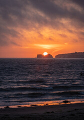 Sun rising over Old Harry Rocks, Dorset