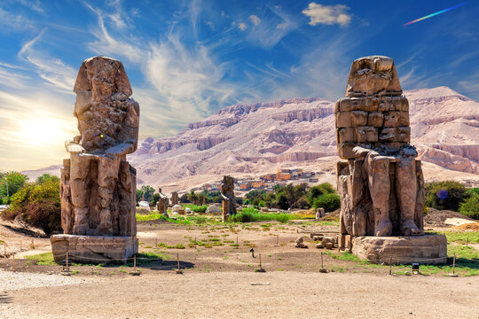 The Colossi of Memnon, famous statues of the Pharaoh Amenhotep in the Theban Necropolis of Luxor, Egypt