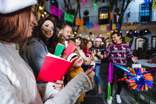 Posada, Mexican Family Singing Carols In Christmas Party In Mexico Latin People