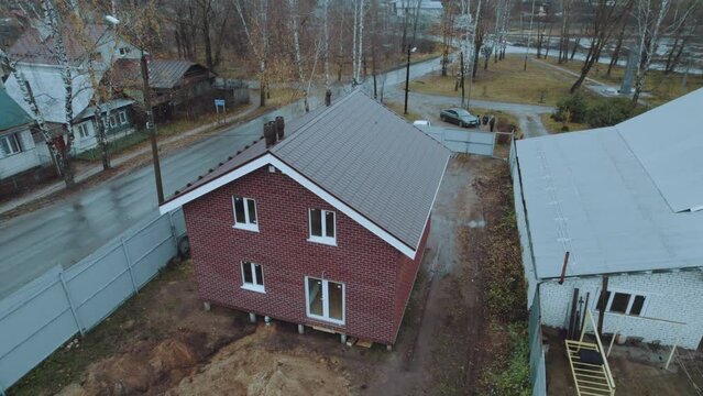 Aerial survey of a newly built frame house, frame house