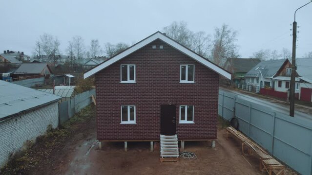Aerial survey of a newly built frame house, frame house