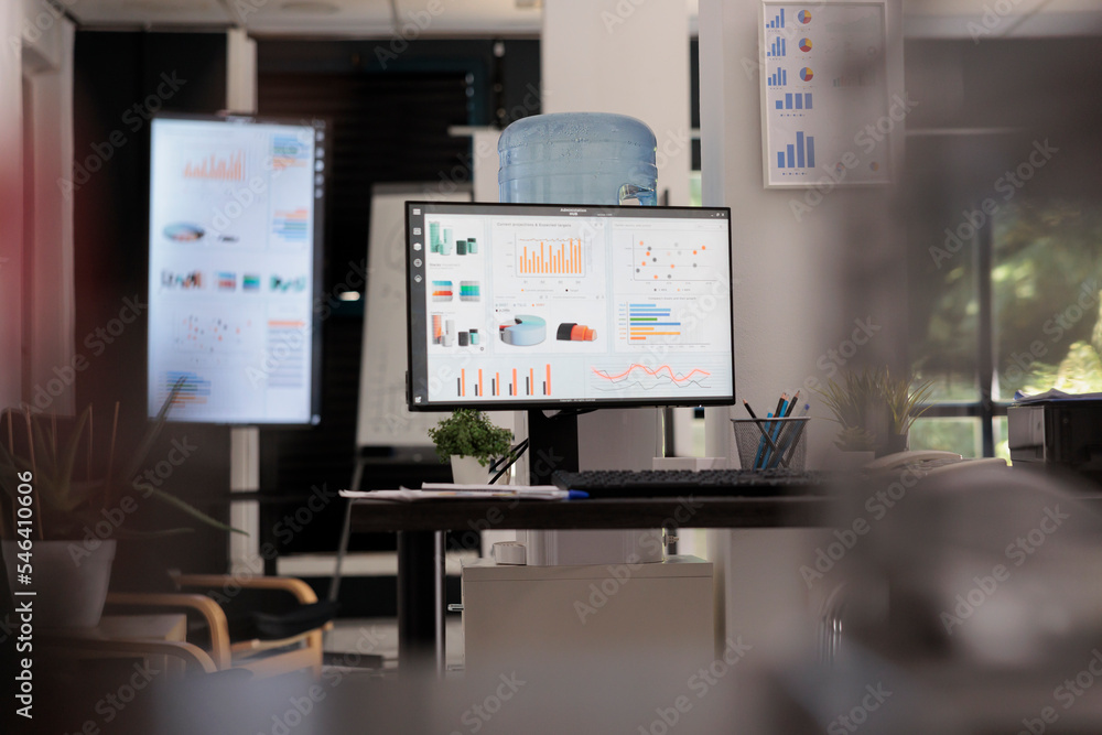Poster financial data analysis company desk with graphical data on desktop computer monitor. statistical ch