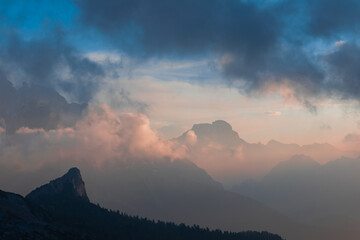 sunrise behind clouds