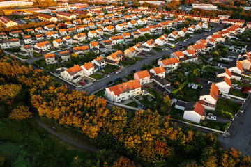 Aerial view on dense residential area with comfortable houses in a city suburb area. Galway town,...