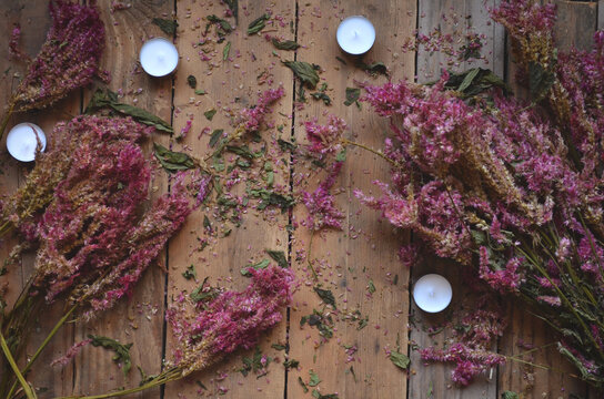Dead Celosia Flowers with Candles on a Rustic Wood Background | Romantic Dead Flowers | Candles with Flowers