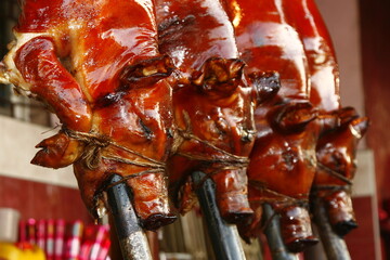Lechon - slowly roasted stuffed sucking pig, a holiday food offering popular in the Philippines