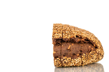One half of rye multigrain bread, macro, isolated on white background.