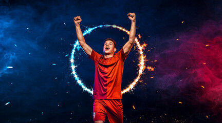 Fototapeta na wymiar Socccer concept. Sports betting on football. Design for a bookmaker. Download banner for sports website. Soccer player winner on a fiery background
