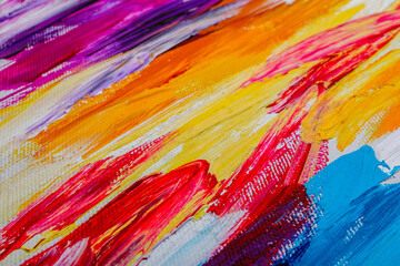 Fototapeta na wymiar Beautiful strokes of colorful oil paints on white canvas as background, closeup