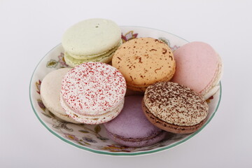 Assorted flavored macarons on a platter