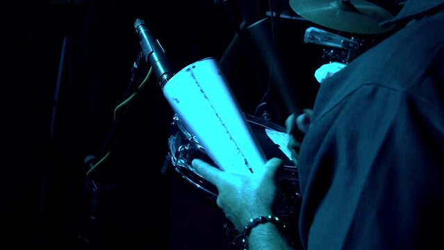 Man Playing The Cowbell In A Salsa Orchestra, Live Music