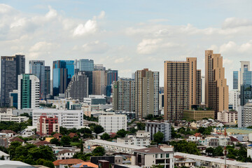 Fototapeta na wymiar Aerial view urban city office building and condominium with residence.