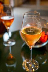 Tasting of brut and rose champagne sparkling wine produced by traditional method in underground caves in Champagne, France