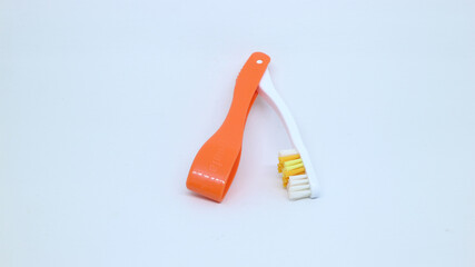 Foldable toothbrush that is easy to carry anywhere isolated white green  