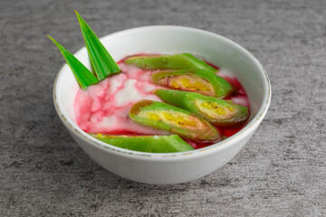 small banana compare to big banana. illustrating a small and big penis comparison. erotic or sex concept isolated on pink background