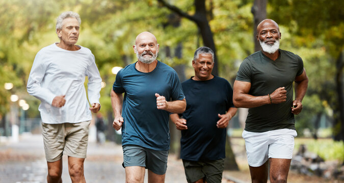 Fitness, running and group of senior men doing exercise, training and workout together in park on weekend. Nature, friendship and old males doing sports outdoors for health, wellness and body care