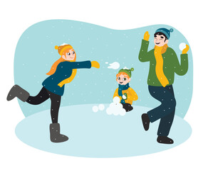 Happy family playing snowball fight on winter day