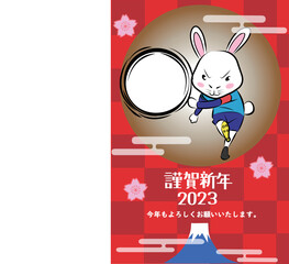 サッカーをするウサギの年賀状