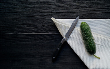 cucumber on a wooden board