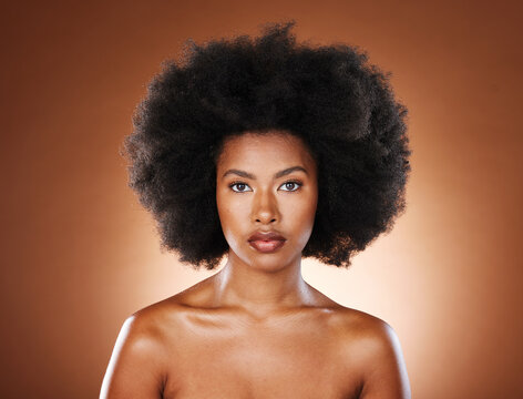 Black woman, face and afro for natural hair care wellness for beauty. African girl model, facial glow or skin healthcare, confident and proud portrait for healthy cosmetics dermatology in studio