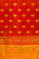 Handmade Indian sari / saree with golden details, woman wear on festival, ceremony and weddings, expensive sarees are famous for their gold and silver zari, brocade. Incredible India.