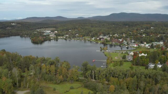 Wide angle drone shot of downtown Rangeley and City Cove in Maine