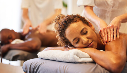 Black couple massage, spa and relax together on vacation, holiday or retreat for bonding, honeymoon...