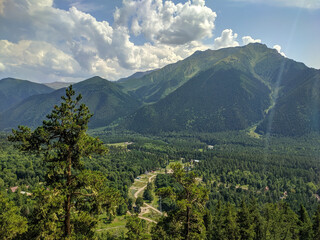 Beautiful view of the landscape of the Caucasus Mountains and the coniferous forest in the village of Arkhyz. Nature concept. Arkhyz, Karachay-Cherkessia, Russia