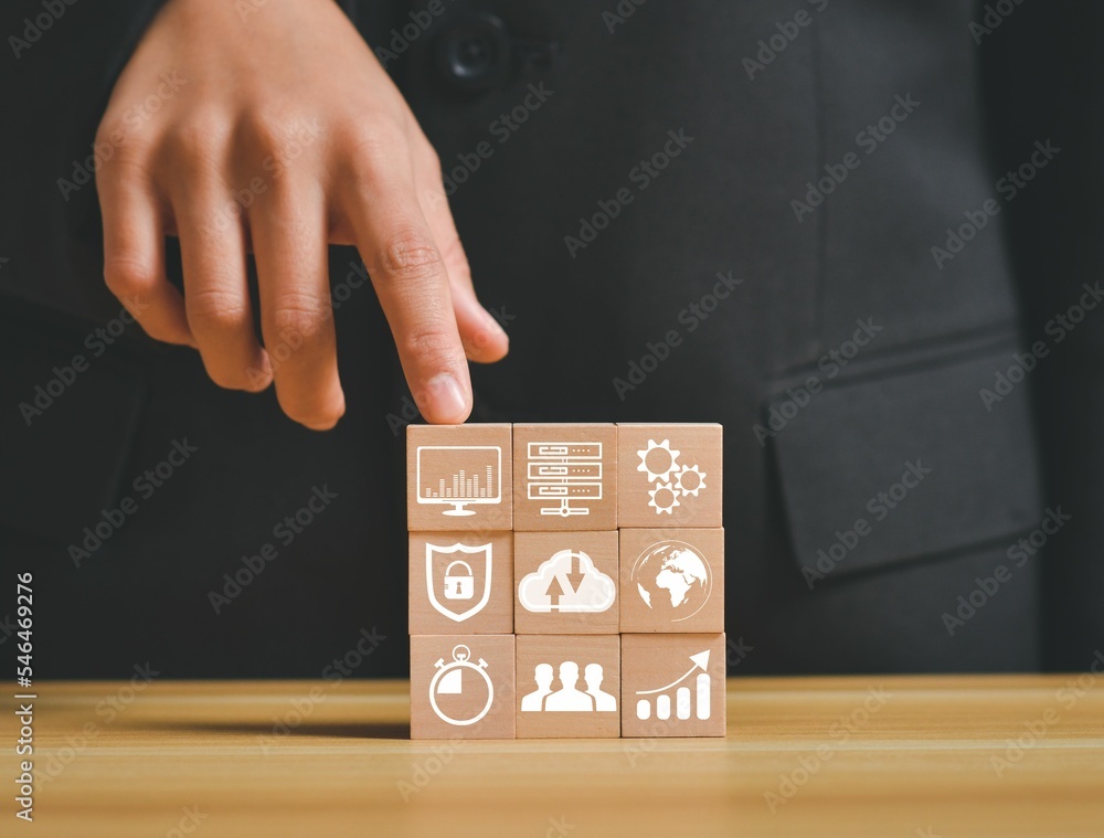 Poster closeup shot of digital transformation management with an icon on a wooden cube stack