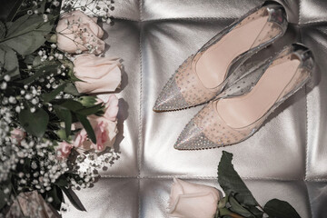 Wedding shoes. rhinestone shoes. party shoes. wedding shoes and a bouquet of flowers. wedding decorations. Wedding accessories