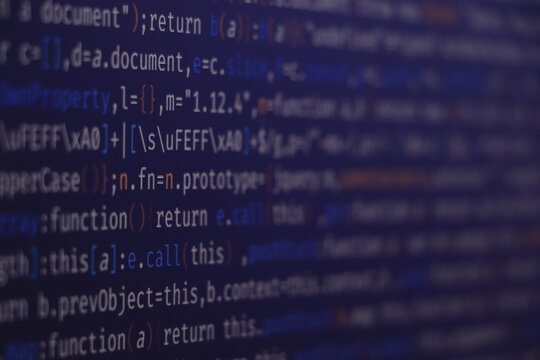 AngularJS in editor for website development. Coding script text on screen. Computer science lesson. Programming code abstract screen of software developer.