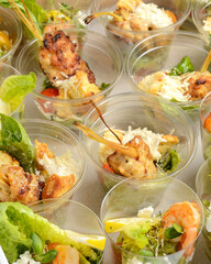 assorted snacks for catering in a cardboard box