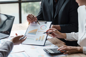 Group of Business people meeting to find marketing investment analytical ideas. Business discuss, finance concept