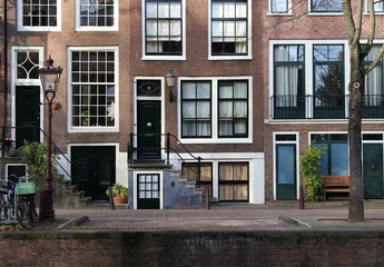 Zelfklevend Fotobehang Amsterdam Leidsegracht Canal Street View with House Facades, Entrance Steps and Vintage Lamppost, Netherlands © Monica
