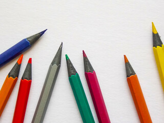 Painting. Pencils on a white sheet of drawing paper. Close-up