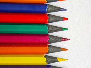 Painting. Pencils on a white sheet of drawing paper. Close-up