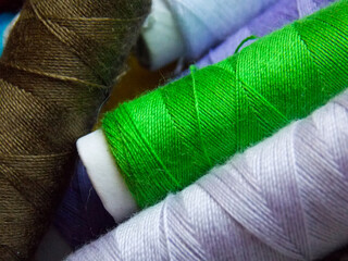 A set of colored threads for sewing. Close-up