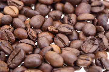 Close-up of the dry coffee beans. Background. Texture