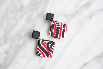 Modern colorful earrings of polymer clay. Handmade jewelry.