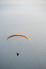paraglider over the sea