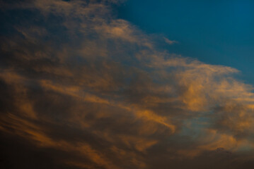 Fototapeta na wymiar Dramatic clouds at the sunset