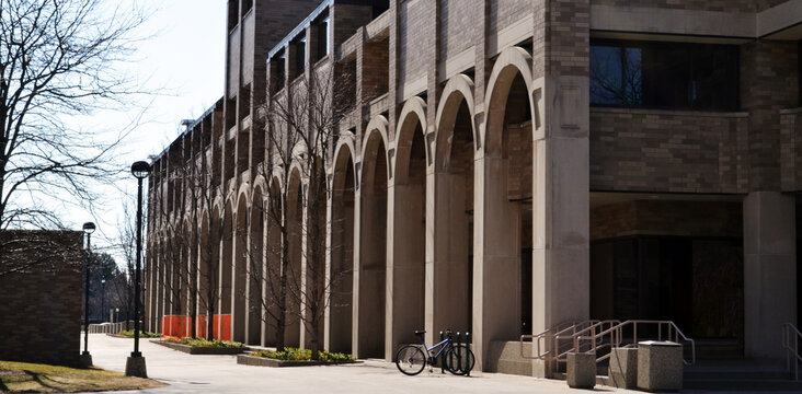 Concrete made Undergraduate Library of the Wayne State University, Detroit, with curved arch piles towers on the side,